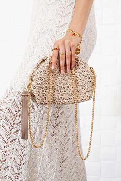 olivia gate حقيبة كتف يدوية بتفاصيل منسوجة من القش