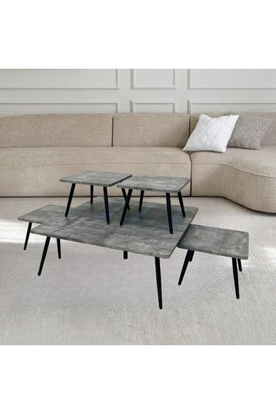 DEC13 A set of serving tables in multiple colors to suit different decors.