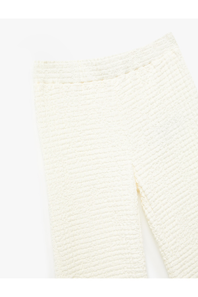 Koton Beli Lastikli Dokulu İspanyol Paça Pantolon
