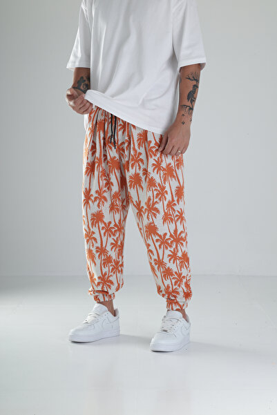 COCOPELLI Помаранчеві джоггери з пальмовим візерунком