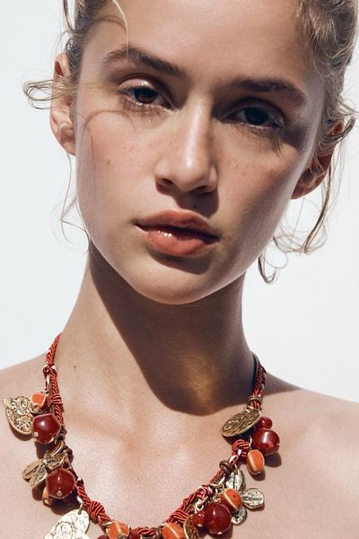Finery by Nerrs Zr Model Knot Detailed Gold Charm Necklace