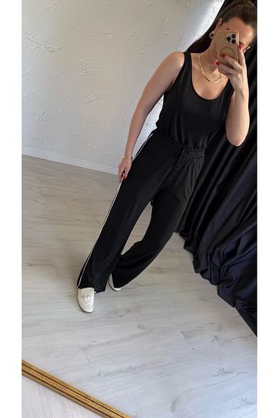 elif teke Kayunga Athlete Suit Black
