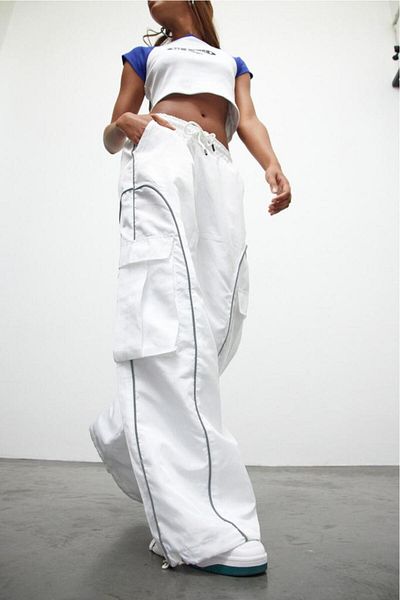 bases. Black Oversize Striped Cargo Pocket Parachute Pants