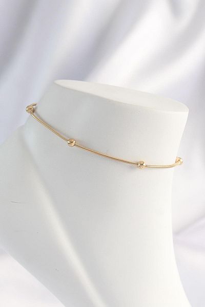 Celira Steel Gold Color Minimal Heel Model Anklet