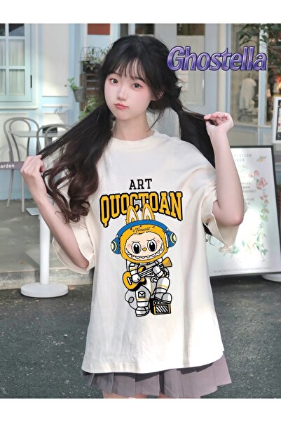 Minga London تيشيرت للجنسين مطبوع عليه عازف موسيقى لابوبو باللون البيج - Ghos...