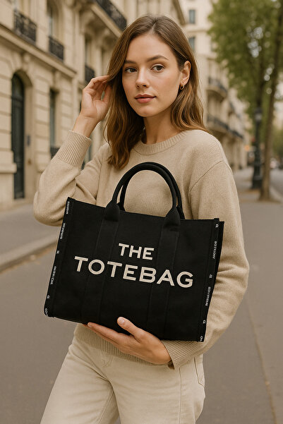 Nuva Land حقيبة حمل من القماش المكتوب