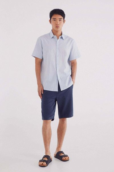 Springfield Bermuda shorts in slim fit dobby fabric , in cotton. Semi-elastic waist.