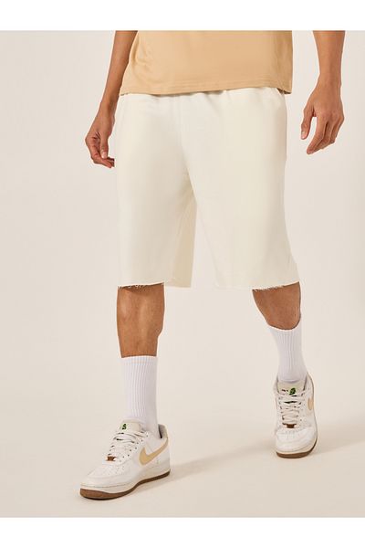 Styli Solid Raw Edge Hem Terry Oversized Shorts