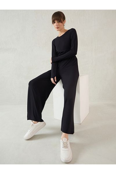 Femmella By Styli Black Smocked Waistband Flared Knit Pants