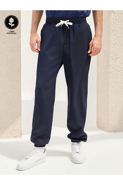 Styli Solid Linen Blend Balloon Fit Trousers with Turn-Up Detail