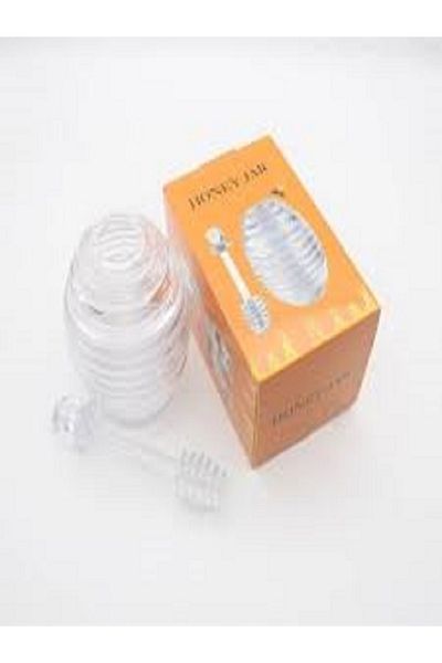 Generic 2 pieces of two types of clear honey and a spoon with a simple crystal honey jar with