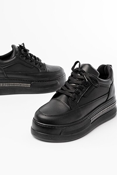 infon shoes creation FLN-1999 Чорні кросівки на шнурівці з каменем на підошві...