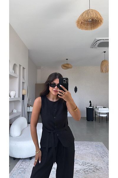 Buket Teke بدلة سترة سوداء بأزرار