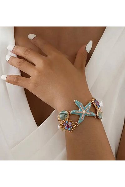 STEELVA Bracelet Decorated with Coral Beads with Seashell Detail