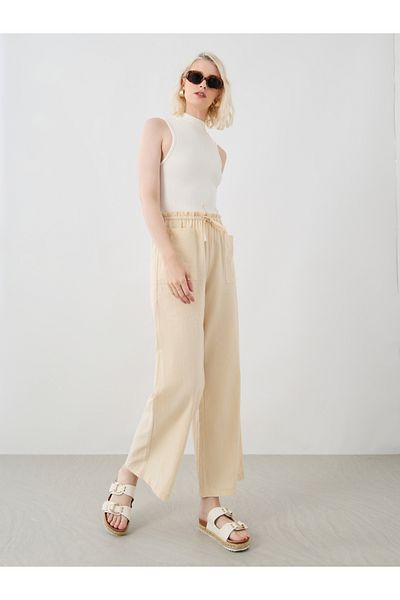 Styli Women Beige Solid Drawstring Waist Wide Leg Pants with Patch Pockets