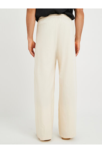 Styli Men Solid Drawstring Waistband Oversized Trousers