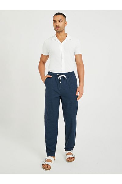 Styli Men Navy Blue Textured Drawstring Regular Fit Pants