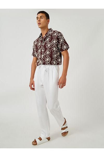 Styli Textured Pleated Tapered Fit Trousers