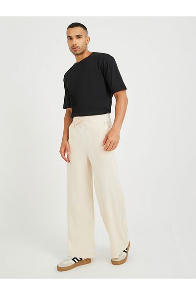 Styli Men Solid Drawstring Waistband Oversized Trousers
