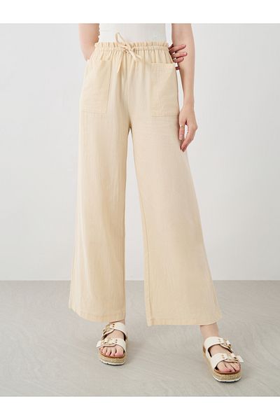 Styli Women Beige Solid Drawstring Waist Wide Leg Pants with Patch Pockets