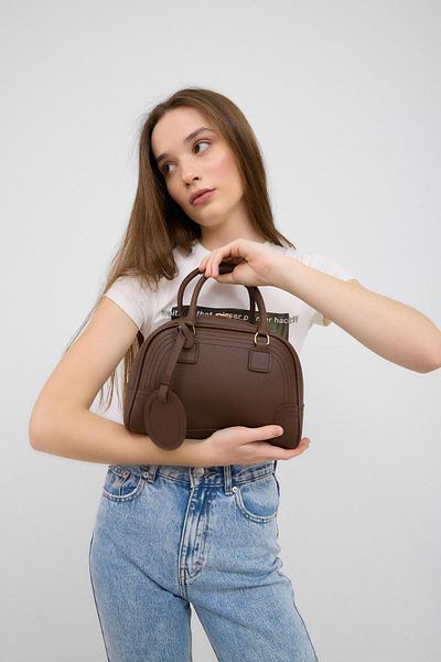 Shule Bags Geantă de mână și crossbody ovală Curve maro