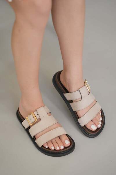 Elvin Shoe Γυναικείες παντόφλες Mari σε μπεζ σουέντ με λεπτομέρεια αγκράφας γ...