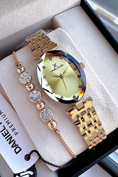 Daniel Klein Oval Case Cutout Glass Waterproof Women's Wristwatch Gold Color Steel Cord Gift Bracelet Dkby2034C7