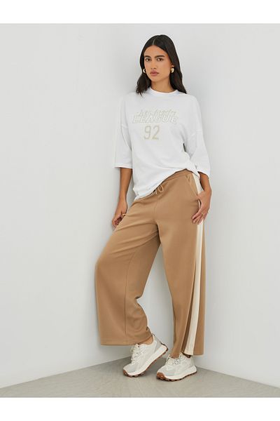 Styli Slogan Print Exaggerated Shoulder Oversized T-Shirt