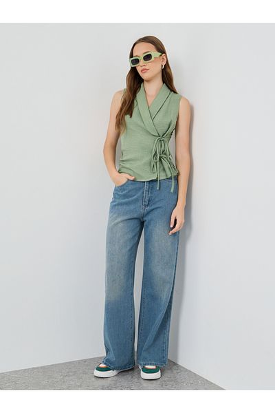 Styli Solid Sleeveless Wrap Top with Tie-Up Detail