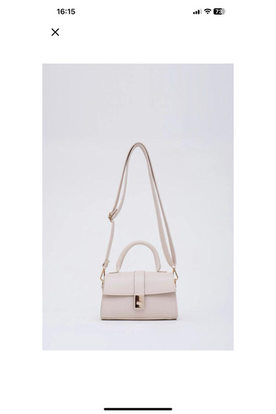 nutika حقيبة لون كريمي