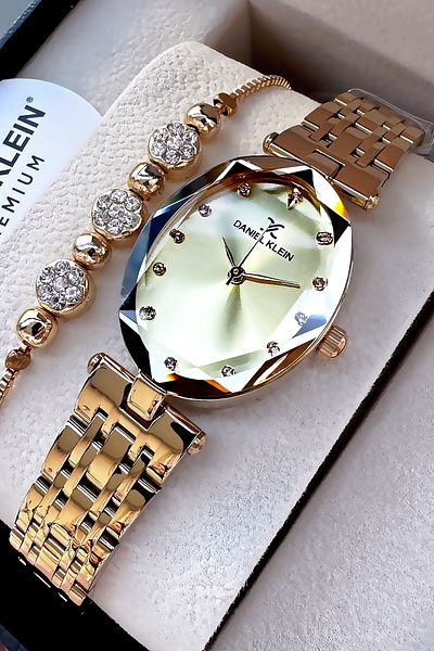 Daniel Klein Oval Case Cutout Glass Waterproof Women's Wristwatch Gold Color Steel Cord Gift Bracelet Dkby2034C7