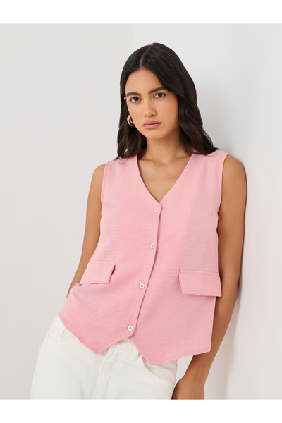 Styli صدرية سادة بجيوب وقصّة مربعة وأزرار