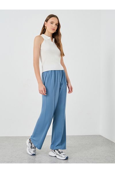 Styli Solid Mid Rise Relaxed Fit Pants with Pintuck Detail