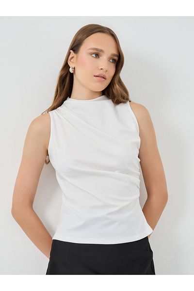 Styli Solid Side Waist Gathered Knitted Top