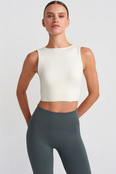 COMEUP Кроп-топ з хрестоподібним вирізом, з вставками на грудях, з ребристою фактурою, білого кольору