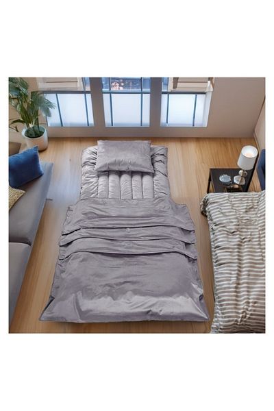 smart home 4-in-1 guest package consisting of a mattress, a light blanket, a pillow, and an elegant bag. Soft velvet package.