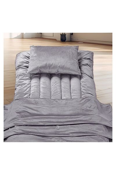 smart home 4-in-1 guest package consisting of a mattress, a light blanket, a pillow, and an elegant bag. Soft velvet package.