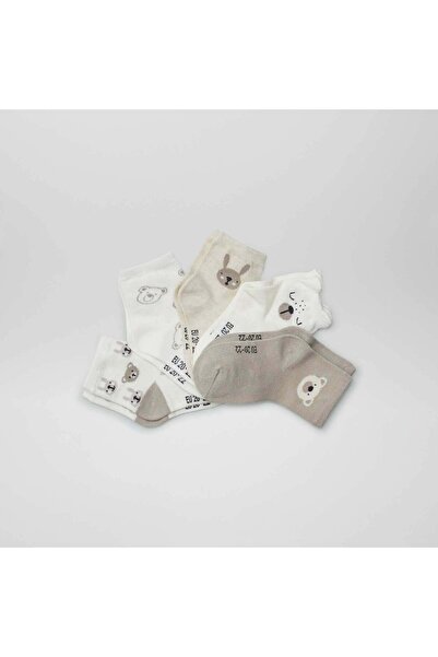 KIABI عبوة من 5 أزواج من الجوارب المحبوكة المطاطية باللون البيج