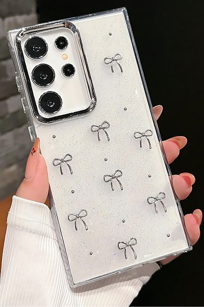 Fibaks حافظة متوافقة مع هاتف Galaxy S25 Ultra بنمط فيونكة وغطاء لامع للكاميرا باللون الفضي اللامع