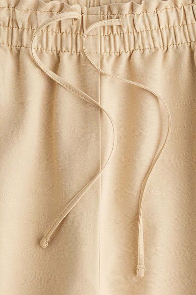 H&M Cropped linen-blend trousers