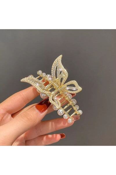 Shiklik MODA Ολοκληρώστε την κομψότητά σας με την εξαιρετική αγκράφα πεταλούδ...