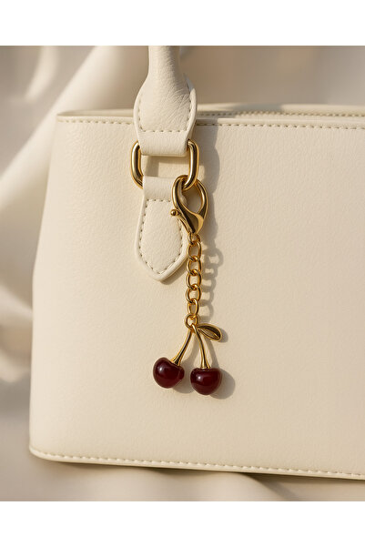 Aura Collection Online حقيبة الكرز سحر وسلسلة المفاتيح