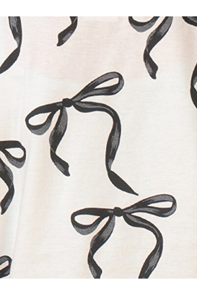 Anthrilo By Styli All-Over Bow Print Short Sleeve T-Shirt and Shorts Set