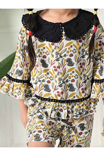 Bella Moda By Styli Printed Ruffled Hem Round Neck Top and Shorts Set