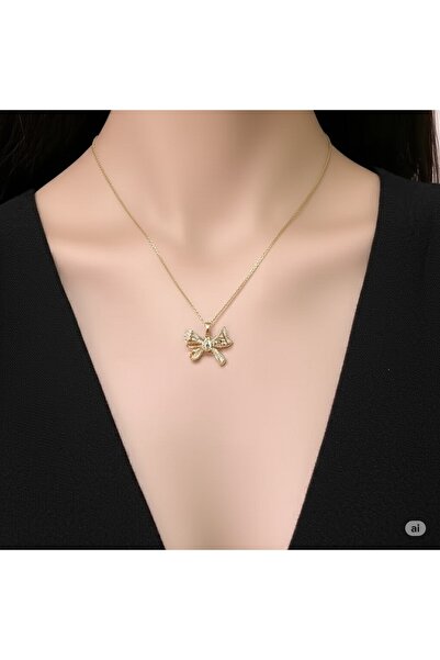 FAMEMUS ACCESSORY قلادة ذهبية بتفاصيل فيونكة فولاذية للحب والمناسبات الخاصة