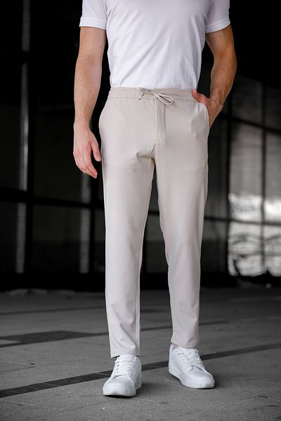 Ser Joven Ανδρικό παντελόνι Jogger με μπεζ χαλαρή εφαρμογή με πλαϊνές τσέπες και ελαστική μέση με κορδόνια