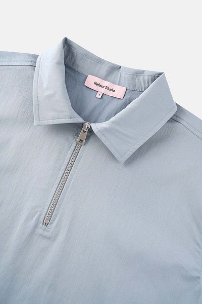 Reflect Studio Tricou de bază țesut cu guler polo cu fermoar pe un sfert - albastru gheață