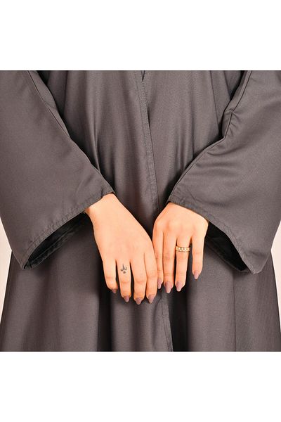 Beyond Grey wrap abaya with a half-cloche