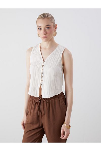 LC Waikiki Bluse aus strukturiertem Musselin mit V-Ausschnitt