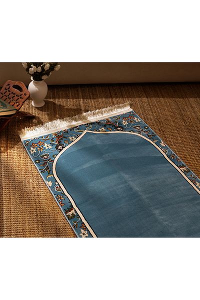 Segadty Mihrab Rug from Sajjati, a quilted prayer rug inspired by the mihrab of the Imam of the Grand Mosque, 70 x 110 cm